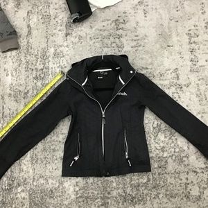Small women’s Black Bench barbecue windbreaker w/ white bench lettering